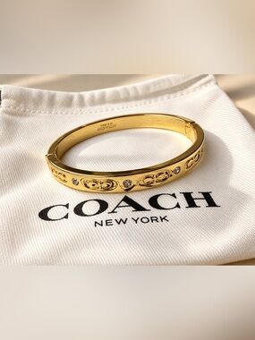 Coach Gold-Tone Crystal Signature Cuff Bracelet